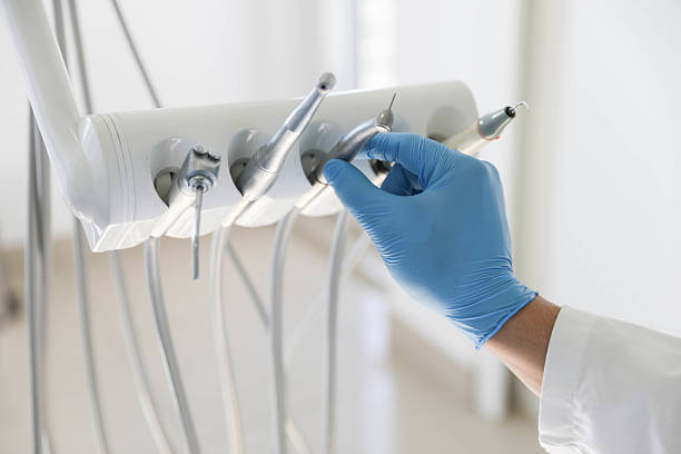 Professional Tooth Extraction technician working in Huntsville, TX